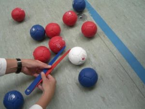 Boccia-Bälle auf einem Spiel-Feld. Boccia-Bälle auf einem Spiel-Feld.